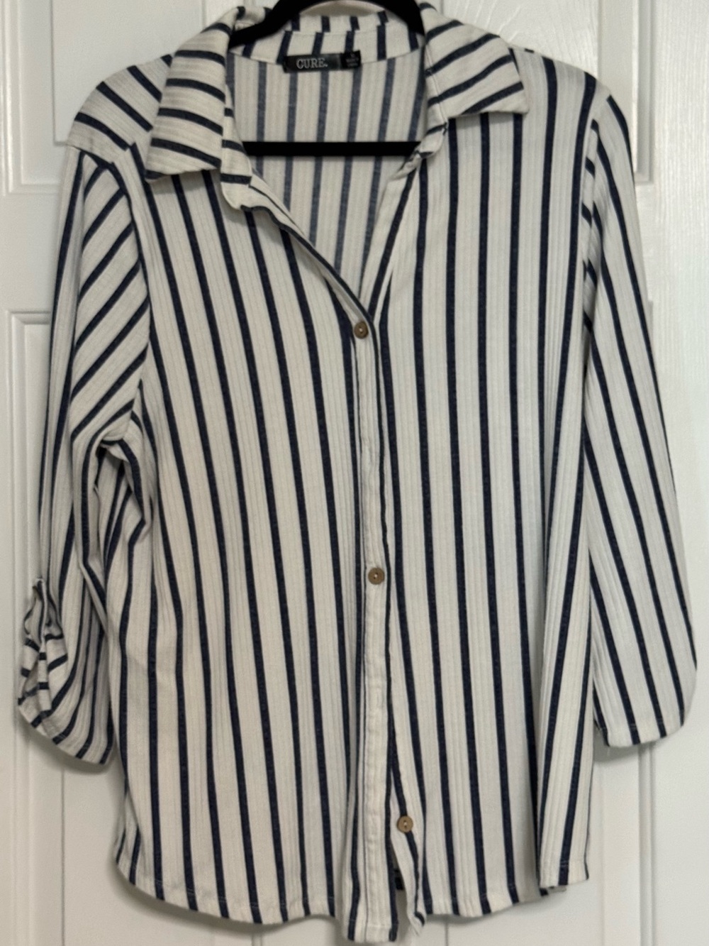 CURE. White and Navy Vertical Stripe Button-Up Blouse